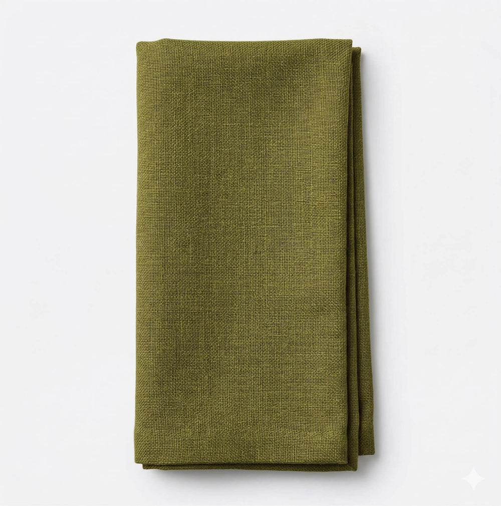 Close-up of elegant Amelia Pale Green Linen, textured and draped gracefully, with visible woven fibers and soft folds creating gentle shadows—ideal for any refined event setting.