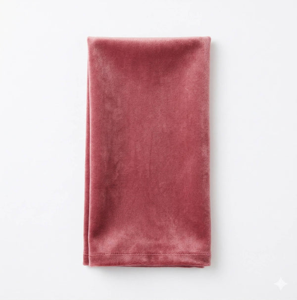 The Charlotte Old Pink Velvet fabric is soft and luxurious, neatly folded and displayed on a white background.