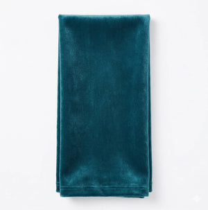 A neatly folded Charlotte Sea Green Velvet napkin is displayed on a plain white background.