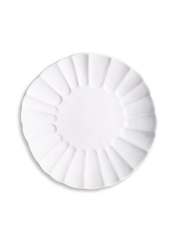 A round white plate from the Babble Plate Range, with a scalloped edge and petal-like design, photographed from above on a white background—perfect for fine dining displays or enhancing any designer plate collection.