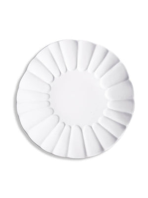 Elevate your tableware with the Babble Plate Range—a white ceramic plate featuring a scalloped, petal-inspired edge, shown from above on a plain white background.