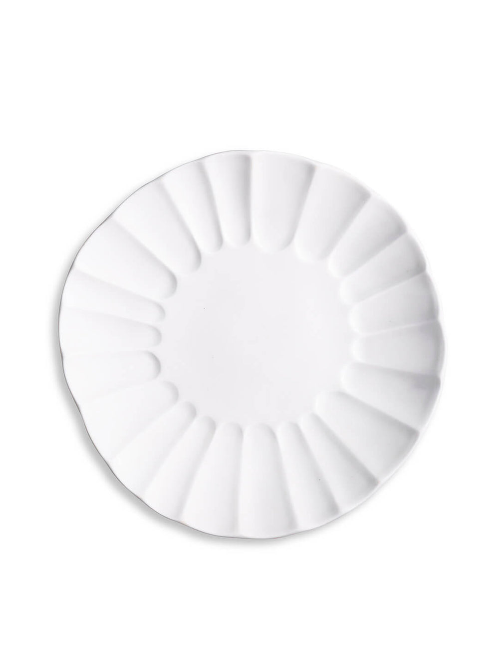 Two white porcelain plates from the Babble Plate Range, one nested inside the other, feature scalloped edges and a petal-like rim design—a refined choice for elegant dining.