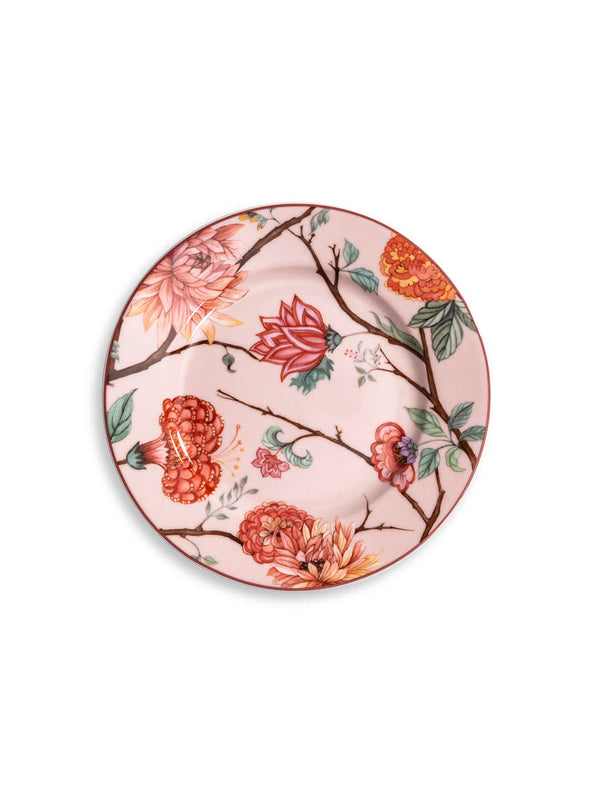 The Botanic Pink Plate Range features round ceramic plates with a light pink background, colorful botanical florals, butterflies in red, pink, orange, green, and a rich reddish rim—adding charm to your tableware.