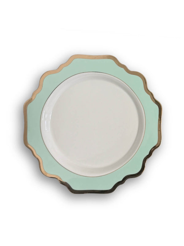 The Colette Green Plate Range features round plates with a white center, light green rim, and gold scalloped edge—ideal for enhancing any modern tableware collection.