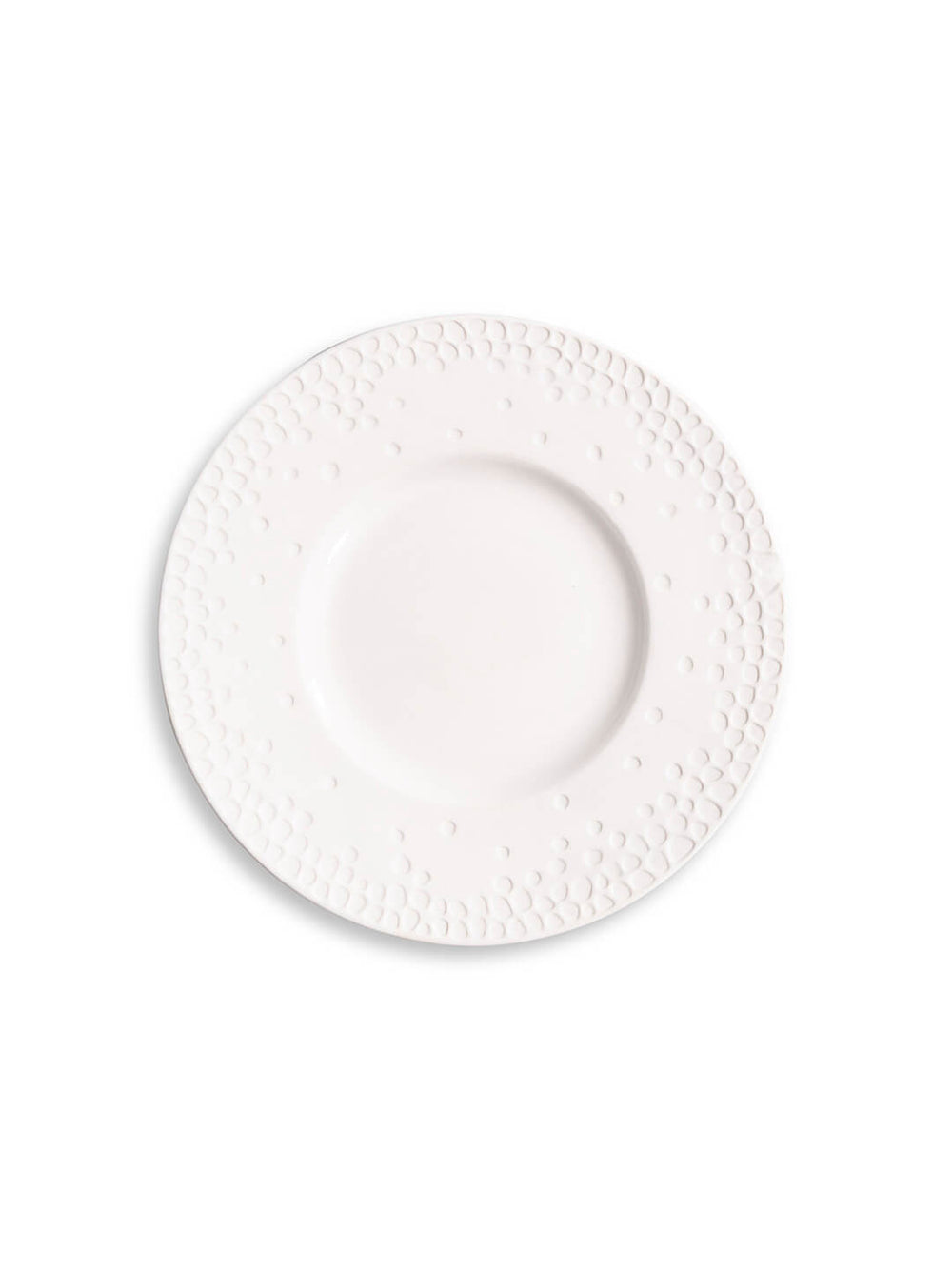 Three stacked white plates from the Dotty Plate Range show an embossed dot pattern on their rims, viewed from above on a white background—ideal modern tableware for those who appreciate subtle texture.