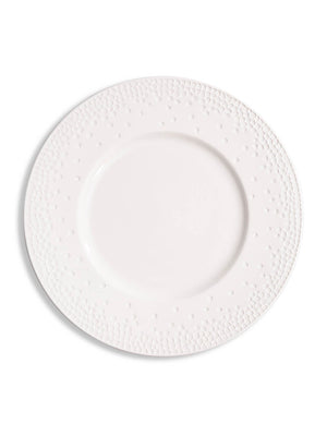 The Dotty Plate Range features a white ceramic plate with an embossed dot pattern around the rim, bringing modern style to your tableware collection.