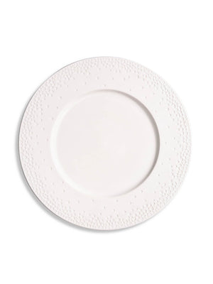 A round white ceramic plate from the Dotty Plate Range, featuring an embossed dot pattern on the rim, is shown from above against a plain white background.