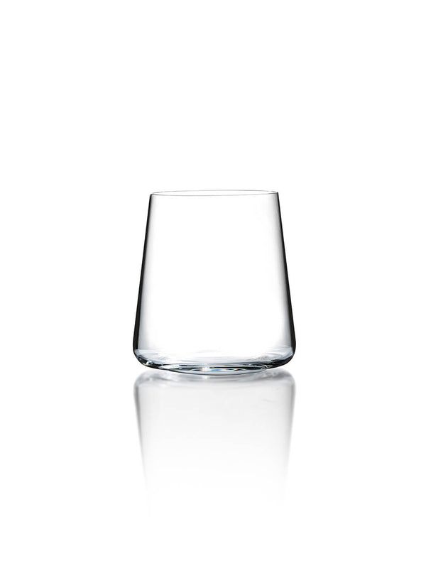 A single empty, clear glass tumbler with straight sides, shown on a white background with a faint reflection—an elegant piece from the Lola Glassware Range, ideal for lovers of modern glassware.