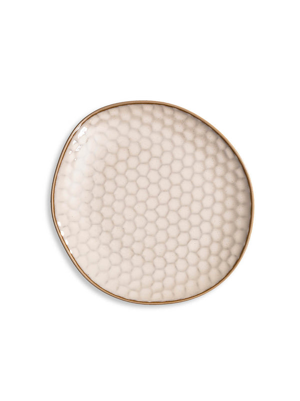 The Lorenzo Plate Range offers a round beige ceramic plate with a subtle honeycomb pattern and uneven gold-trimmed wavy rim—handcrafted and ideal for modern rustic weddings, shown on a white background.