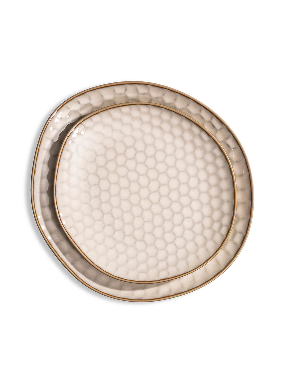 The Lorenzo Plate Range features handcrafted ceramic plates with an irregular oval shape, honeycomb texture, and gold rim—ideal for modern rustic weddings. Shown on a white background.