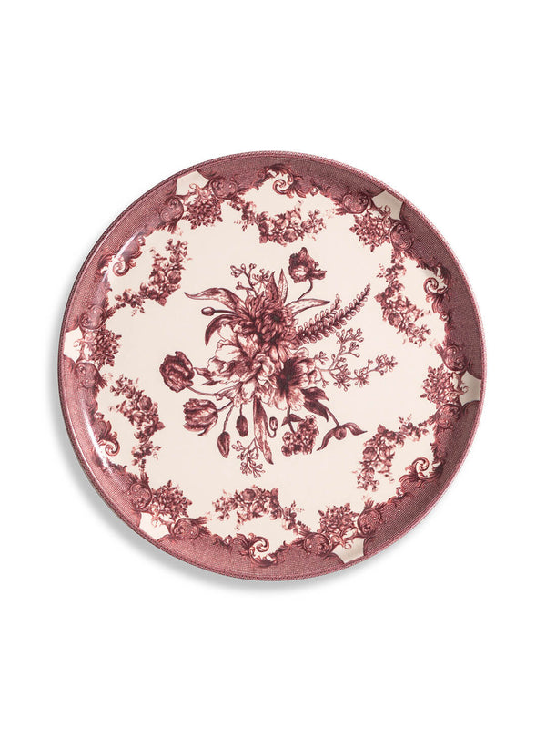 The Lucinda Rose Plate Range features a round vintage plate with a burgundy floral centerpiece and ornate border on a cream background, detailed with classic flowers and swirls for timeless charm.