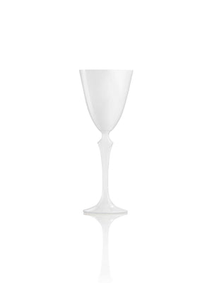 An empty white wine glass from the Mara Glassware Range stands upright on a white surface with a subtle reflection, highlighting the range's elegant minimalist design.
