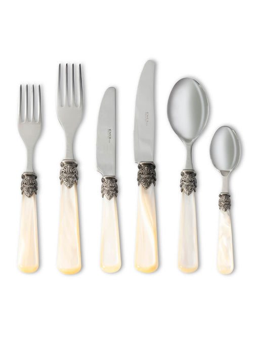 The Marina Cutlery Range is a six-piece vintage set with ornate silver detailing and mother-of-pearl handles, featuring two forks, two knives, a large spoon, and a small spoon, displayed on a white background.