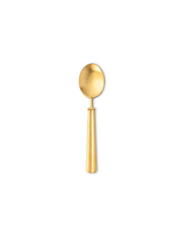 The Mete Gold Cutlery Range features a gold-colored metal spoon with a round bowl, wide tapered handle, and matte gold finish, exemplifying modern style. Shown on a plain white background.