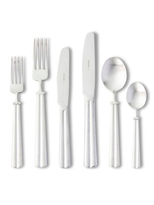 Six pieces from the Mete Sliver Cutlery Range‚Äîtwo forks, two knives, and two spoons in different sizes‚Äîare displayed upright in a row on a white background, highlighting their luxury design.