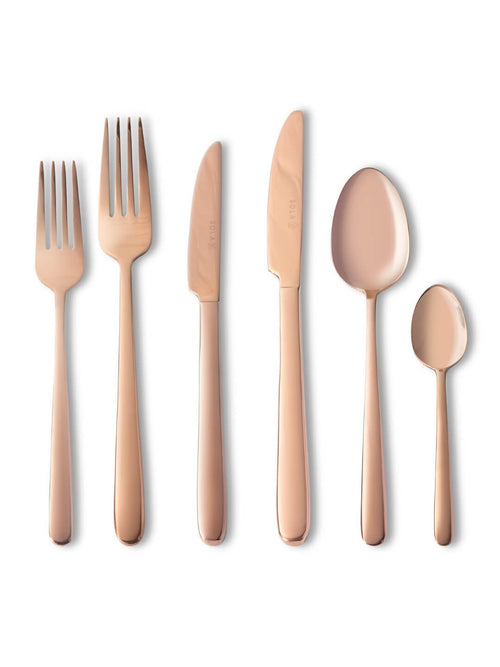 Six pieces from the Mico Copper Cutlery Range—two forks, two knives, a tablespoon, and a teaspoon—are arranged side by side on a white background.