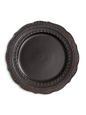A round, matte black plate from the Noir Plate Range features an ornate, embossed rim and is shown from above on a white background—bringing elegance to your table with this stylish dinnerware.