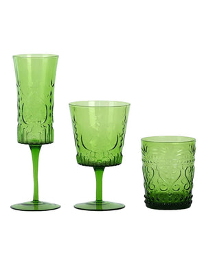 Three embossed goblets from the Nola Green Glassware Range, each with unique heights and shapes, are arranged on a white background. Their ornate vintage patterns make them ideal for adding charm to rustic wedding decor.