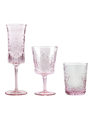 The Nola Pink Glassware Range includes three vintage-style glasses—a tall flute, medium goblet, and short tumbler—all with ornate embossed patterns, perfect for enhancing any pink glassware collection.