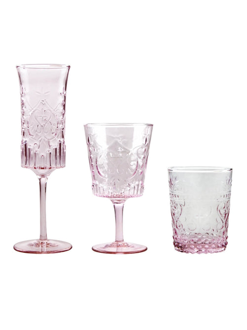 The Nola Pink Glassware Range includes three vintage-style glasses—a tall flute, medium goblet, and short tumbler—all with ornate embossed patterns, perfect for enhancing any pink glassware collection.