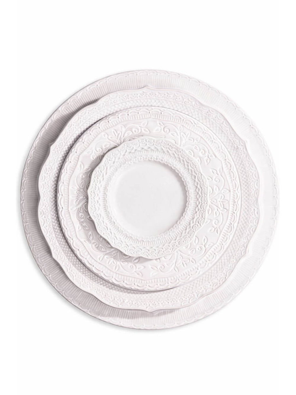 The Opaline Plate Range includes four ivory-white charger plates in graduating sizes, featuring embossed patterns and scalloped edges—ideal for creating an elegant table setting.