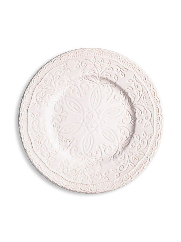 The Opaline Plate Range features ivory-white charger plates with ornate embossed floral and scrollwork patterns on the rim and center, adding charm to any elegant table setting. Displayed on a white background.