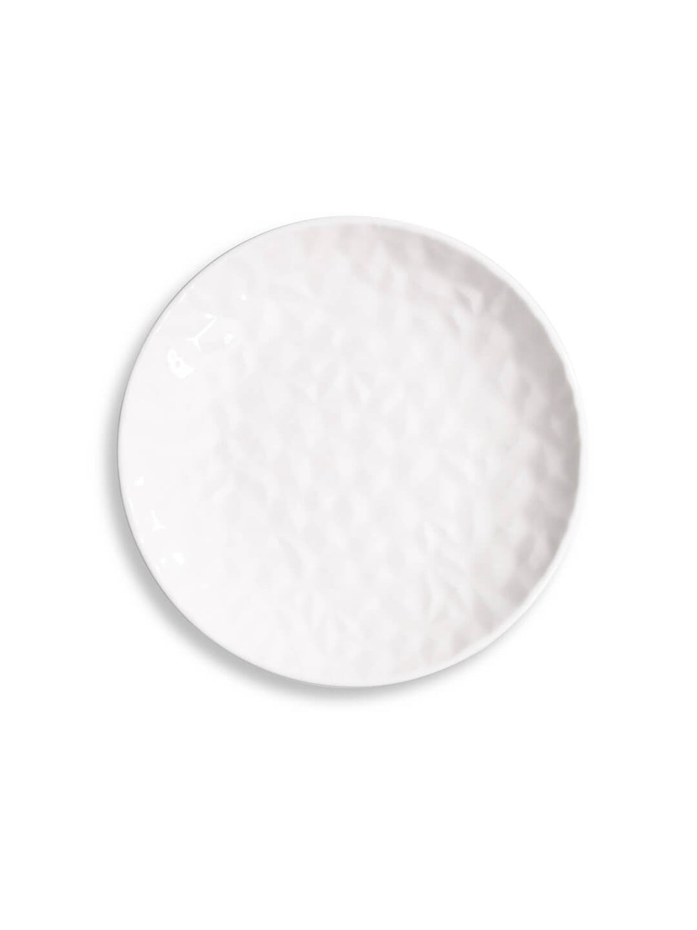 Three white ceramic plates from the Sky Plate Range, each a different size with a subtle hammered texture, are stacked concentrically on a white background.