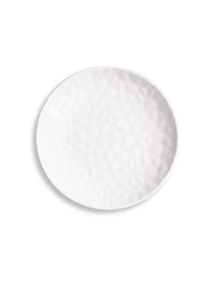 From the Sky Plate Range, a modern round white ceramic faceted plate with a dimpled, textured surface is displayed on a plain white background.