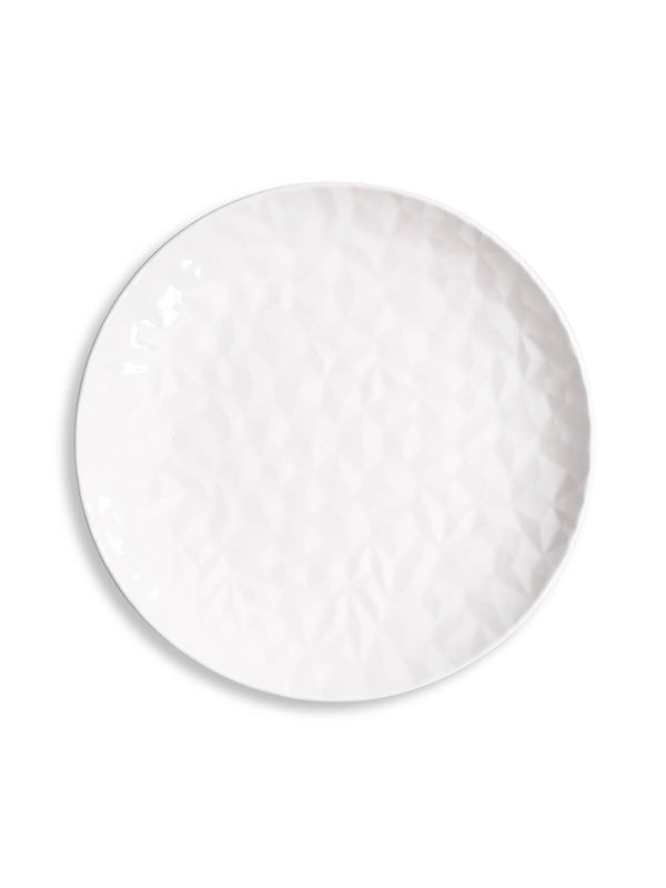 The Sky Plate Range features round, white ceramic plates with a subtle geometric texture—perfect for modern dinnerware collections and shown against a white background.