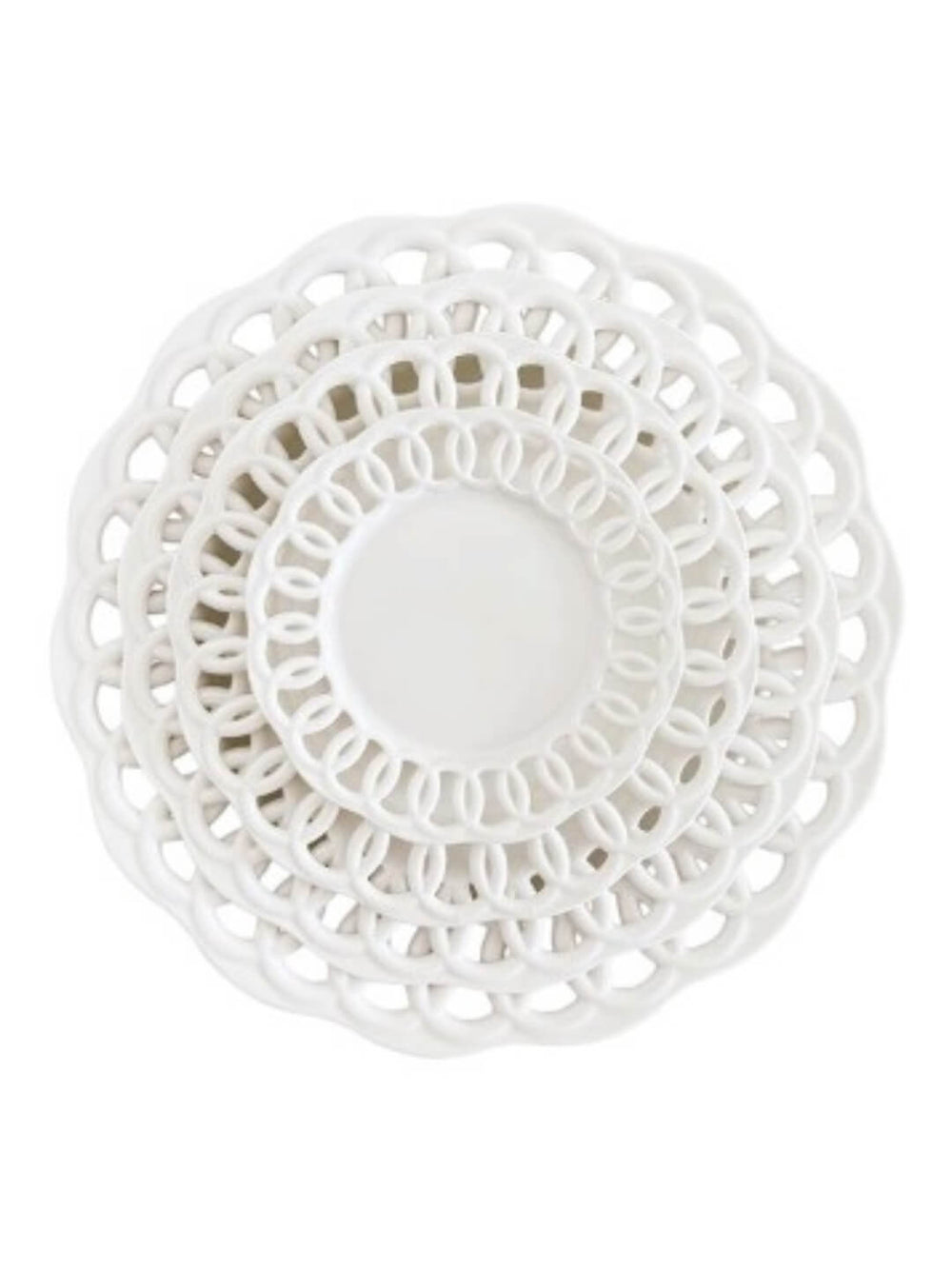 Four stacked Sol Plate Range dishes in white, each a different size, feature openwork lace-like edges. Viewed from above, the layered circles create a modern, elegant design.