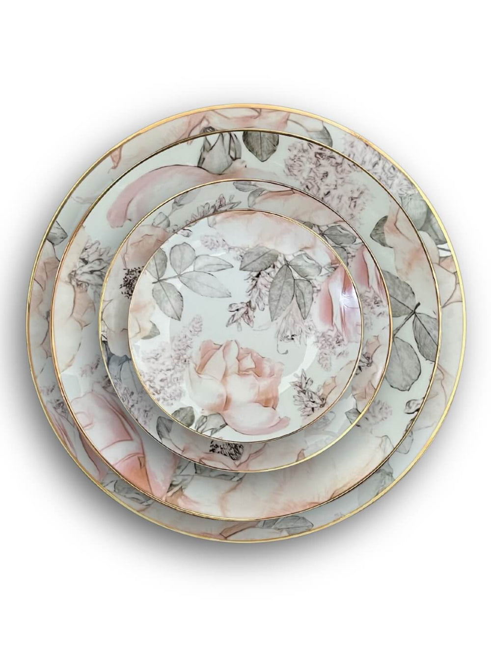 The Vera Plate Range features four round porcelain plates, stacked by size, with pastel pink rose and green leaf patterns and finished with a gold rim—perfect for elegant, garden-inspired table settings.