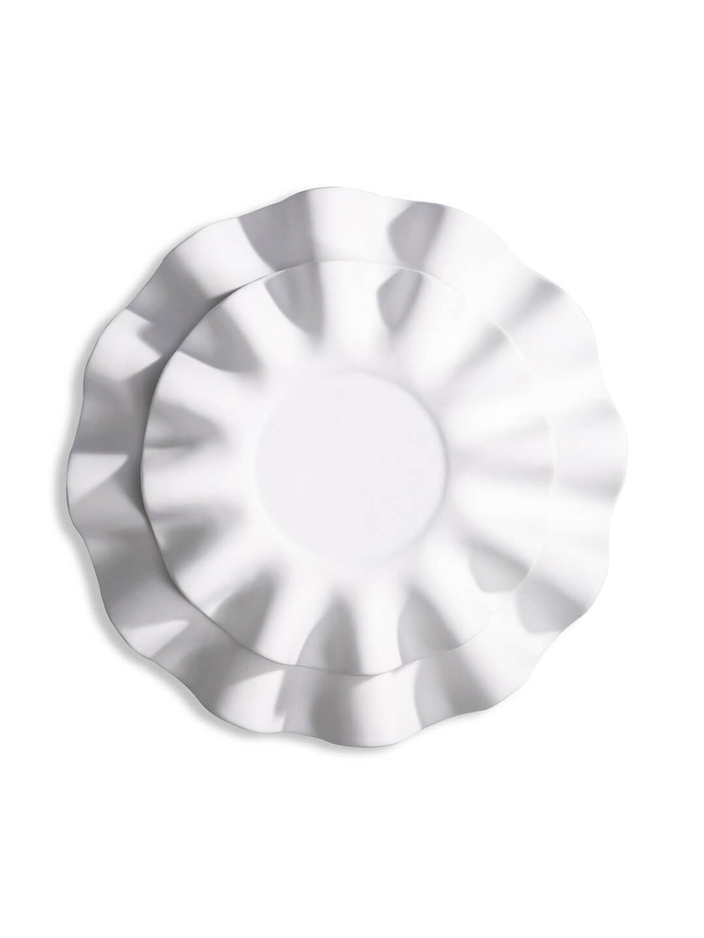 Two plates from the Wave Plate Range, with wavy, ruffled edges, are stacked and viewed from above on a white background—ideal fine dining tableware by Pordamsa.