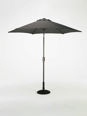 The Amalfi Parasol, a large black weather-resistant umbrella with a central pole and round base, stands open against a white background—ideal for reliable shade at outdoor events.