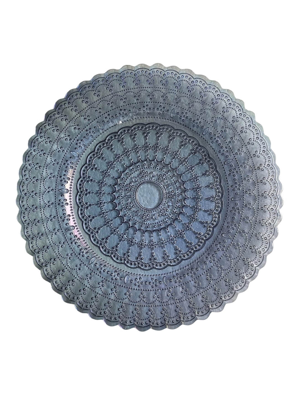 The Antoinette Blue Charger Plate features a round, decorative design with intricate floral and geometric patterns and scalloped edges, making it perfect for coastal wedding decor, shown against a white background.