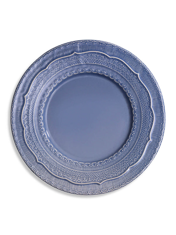 The Azure Charger Charger Plate is a round blue ceramic piece featuring coastal elegance, intricate rim patterns, and a vibrant blue glaze, beautifully displayed on a white background.