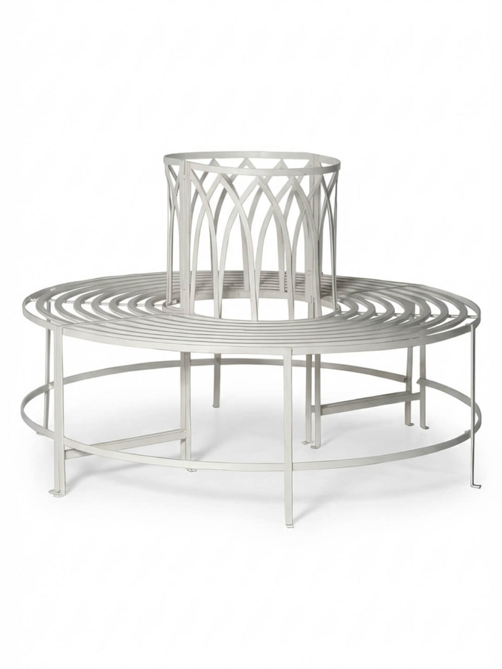 The Circa Seat is a round, silver metal garden bench with an open center and decorative backrest, designed to wrap around the base of a tree for stylish outdoor seating.