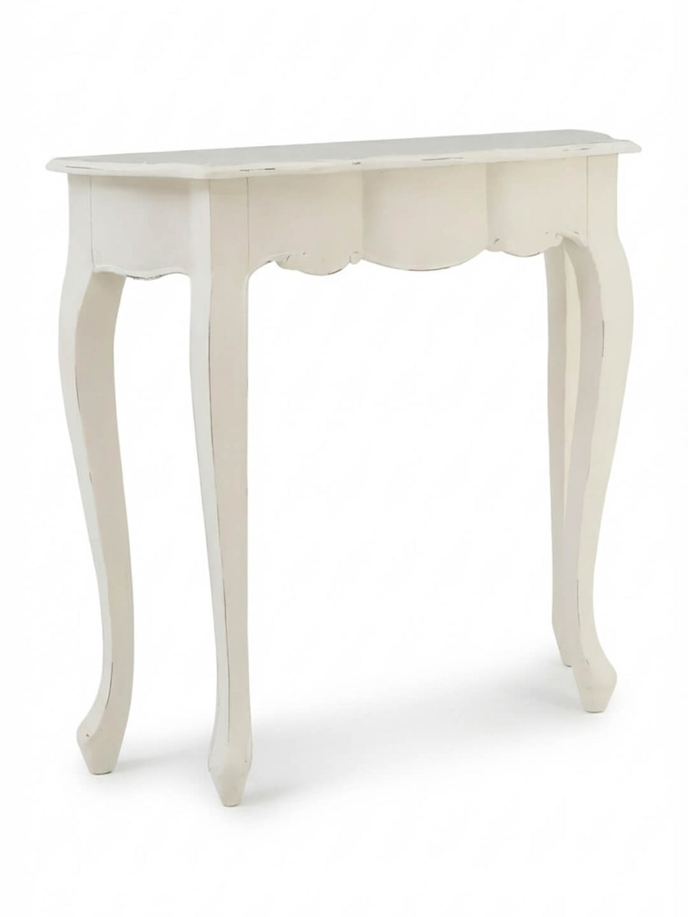 The Colette Console Table is a small, white table with curved legs and scalloped front detailing, adding Parisian elegance to any space.