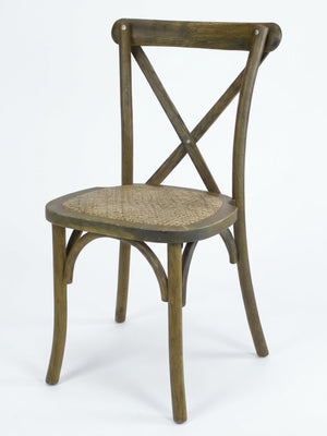The Cross Back Chair, featuring a woven rattan seat, is ideal for rustic event or wedding hire and is showcased here against a plain white background.