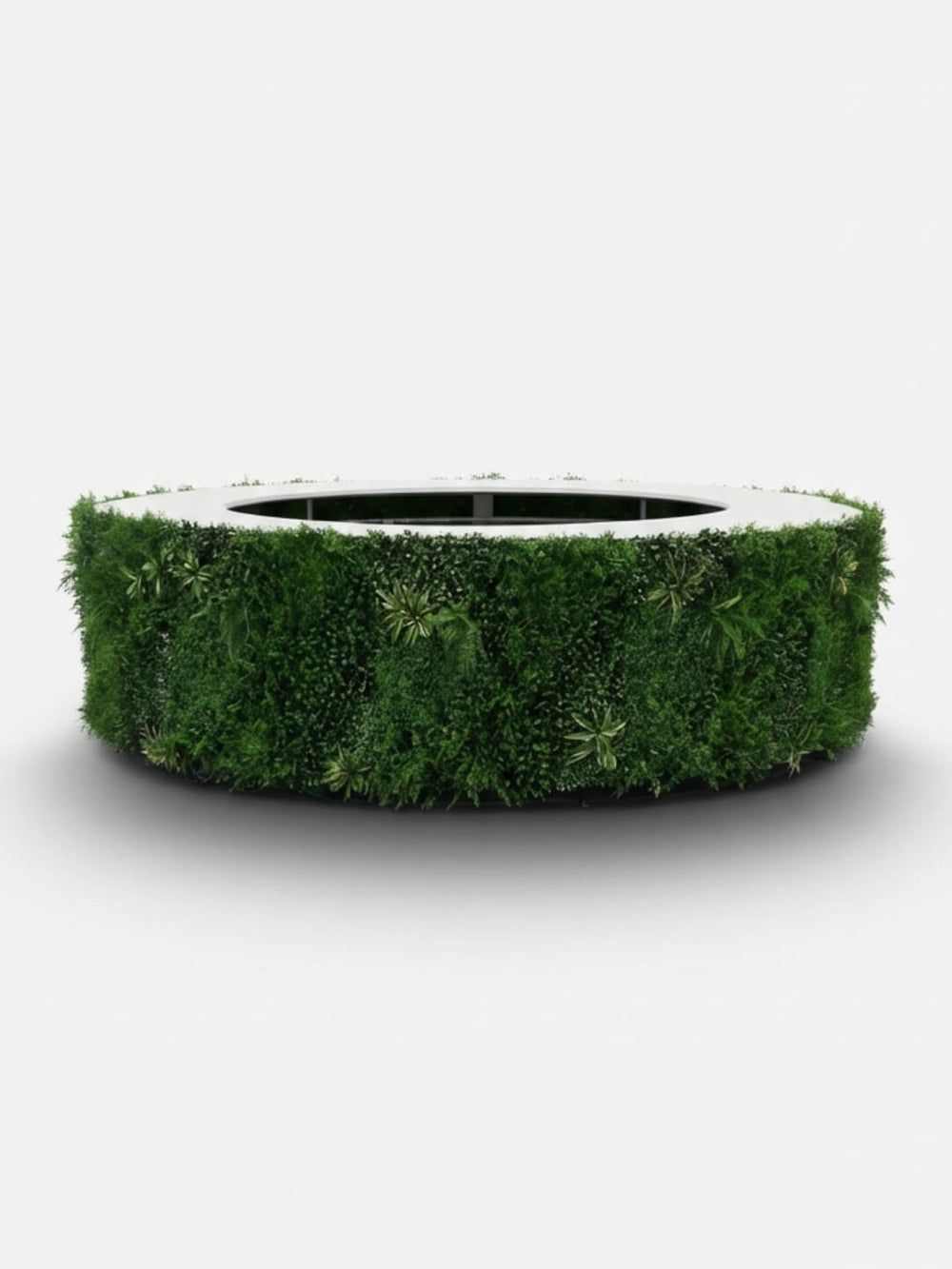 The Foliage Bar is a large, circular bar wrapped in lush green plants, forming a natural living surface around its sides against a plain white background.