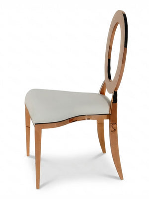 The Halo Chair features shiny metallic gold legs and frame, a circular open backrest, and a cushioned white seat—ideal for modern event seating—shown in side view on a plain white background.