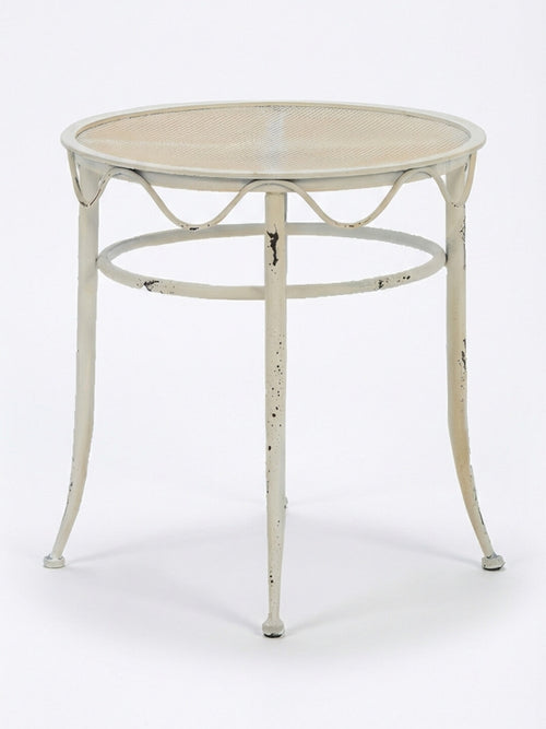 The Jardin Table is a vintage French garden table with a mesh top, three slender weathered legs, and a decorative wavy edge—ideal as charming furniture for outdoor events.