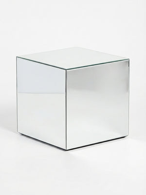 A minimalist, mirrored side table from the Luxe Cube Collection, perfect for events and styled on a plain white background.