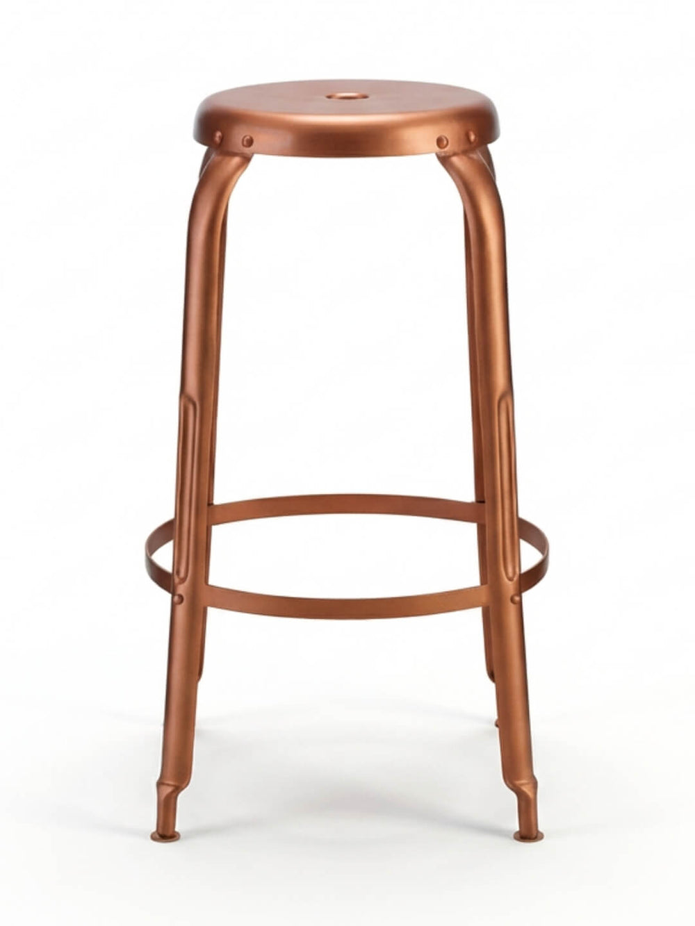 The Penny Bar Stool features a tall, copper design with four legs, a round seat, and a circular footrest. Its simple, industrial look makes it a stylish option for modern spaces.