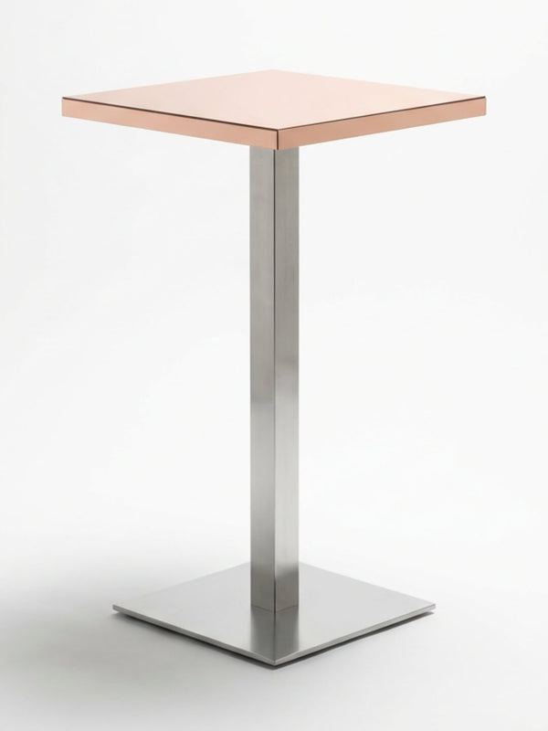 The Reflection Table Collection features a modern, minimalist table with a square light brown top and a single metallic pedestal base on a square platform—ideal luxury bar furniture for refined spaces.