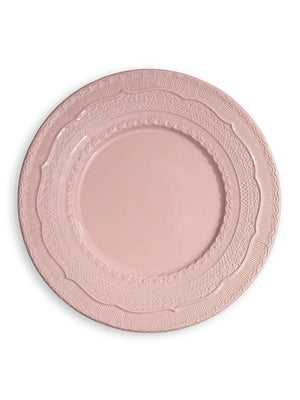 The Roseate Charger Plate features a round, blush-pink design with ornate, textured rim detailing—ideal for adding elegance to wedding table decor. Shown on a white background.