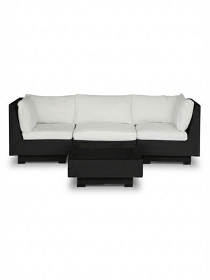 The Sereno Black features a modern black modular sofa with white cushions and a matching rectangular coffee table, highlighting contemporary outdoor furniture style against a plain white background.