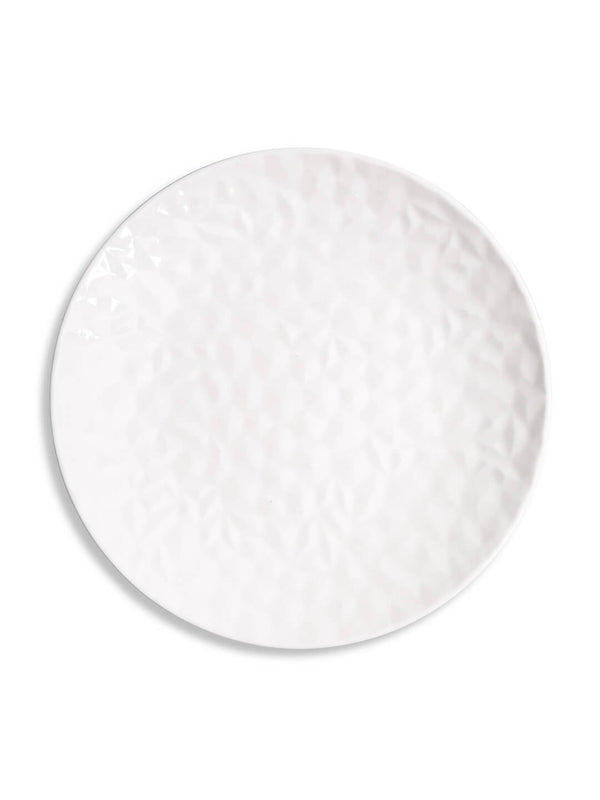 The Sky Charger Plate is a round white ceramic plate with a subtle textured geometric pattern, ideal as a modern charger plate for luxury wedding tableware. Photographed against a plain white background.