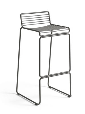 The Slate Bar Stool features a minimalist black metal wire frame with parallel rod seat and backrest, armless design, and straight sled legs for a sleek, modern look.