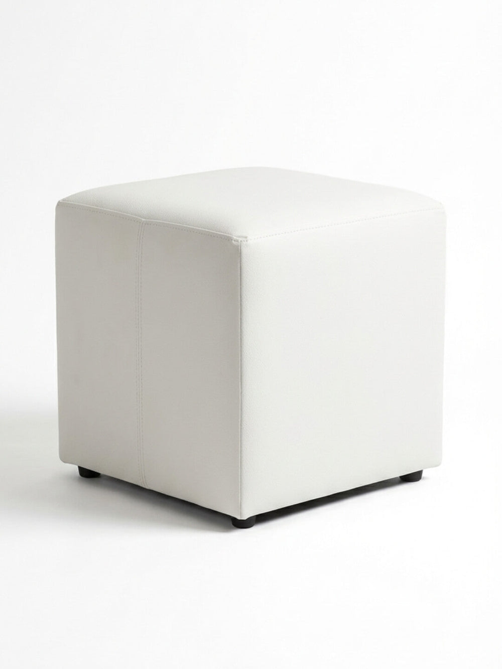 The Soho Cube is a white faux leather ottoman with smooth upholstery and short black legs, making it an ideal minimalist seat for events when set against a plain white background.