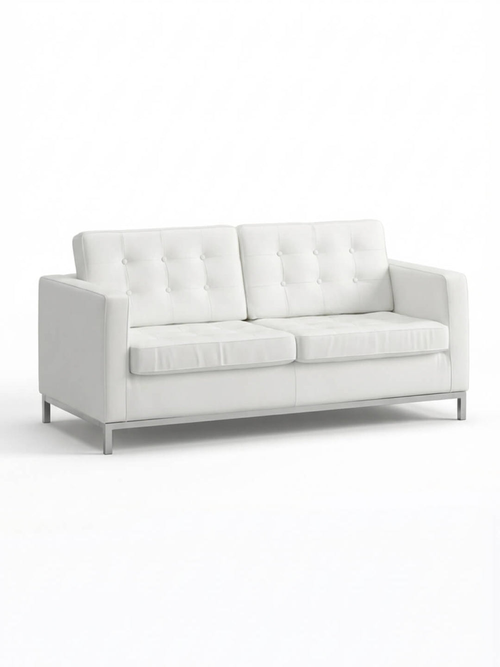 The Soho Sofa is a modern white faux leather piece with tufted back cushions, straight arms, and metal legs—ideal as stylish event furniture against a plain white background.